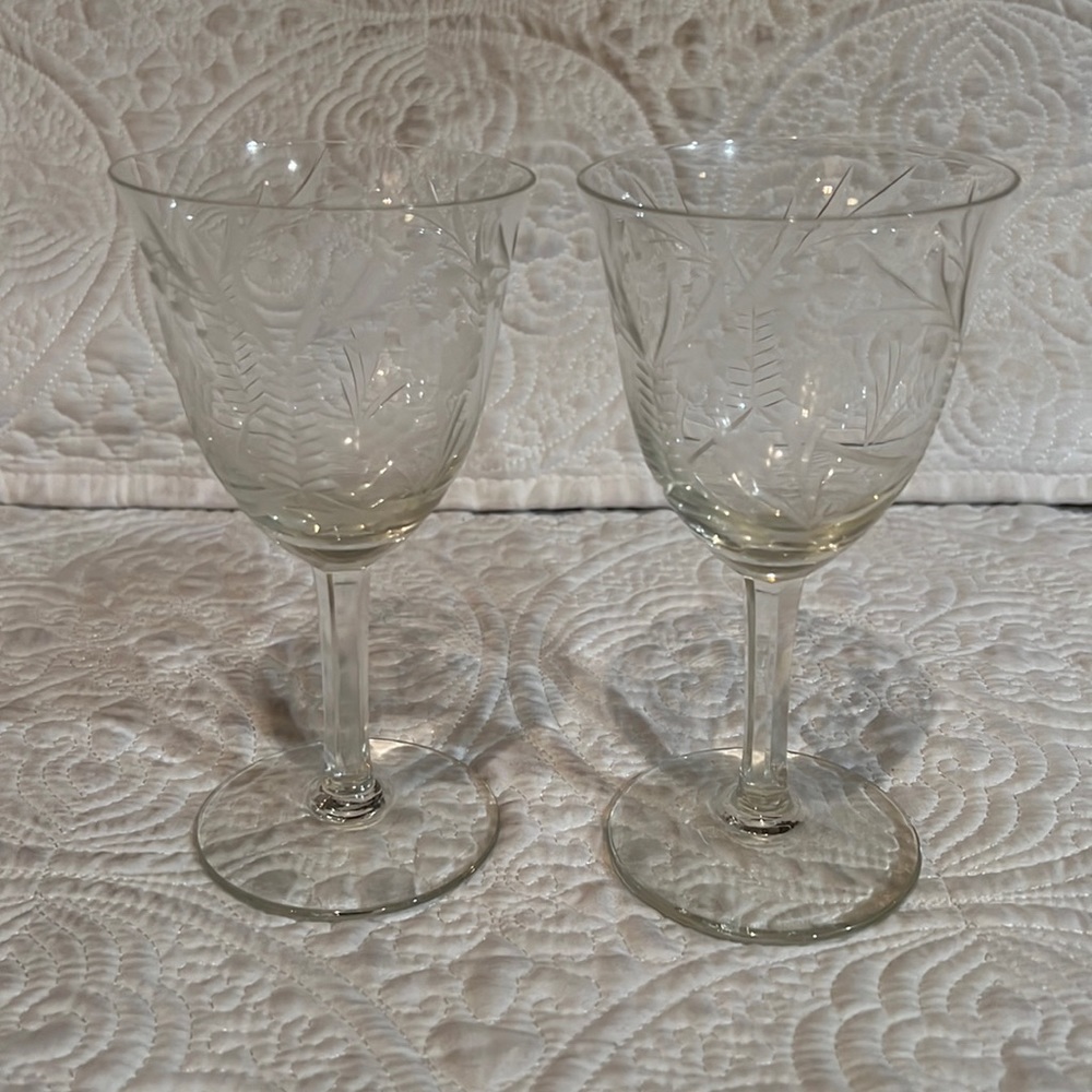 Set of two etched wine glasses